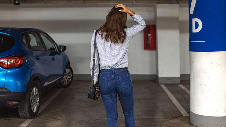 Young woman's car was stolen, can't find car at underground parking. Woman returned after shopping and didn't find her car on underground parking. ; Shutterstock ID 1723661248; purchase_order: 22903; job: 456-22903-2596 F21 TDI GI SEO POD - Onsite Banners; client: Daniel Mouck/Shelley Wildeman; other: Insurance - GI