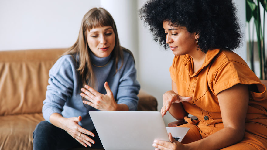 Two people discussing different types of life insurance